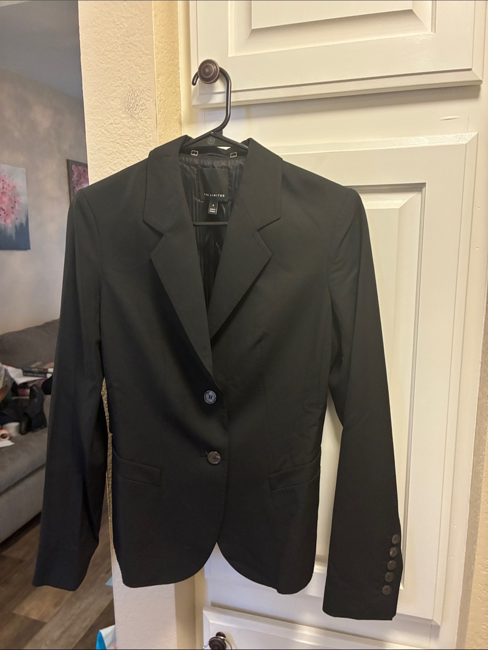 The Limited Black Women's Blazer Jacket w/ two-button closure and notch lapels.